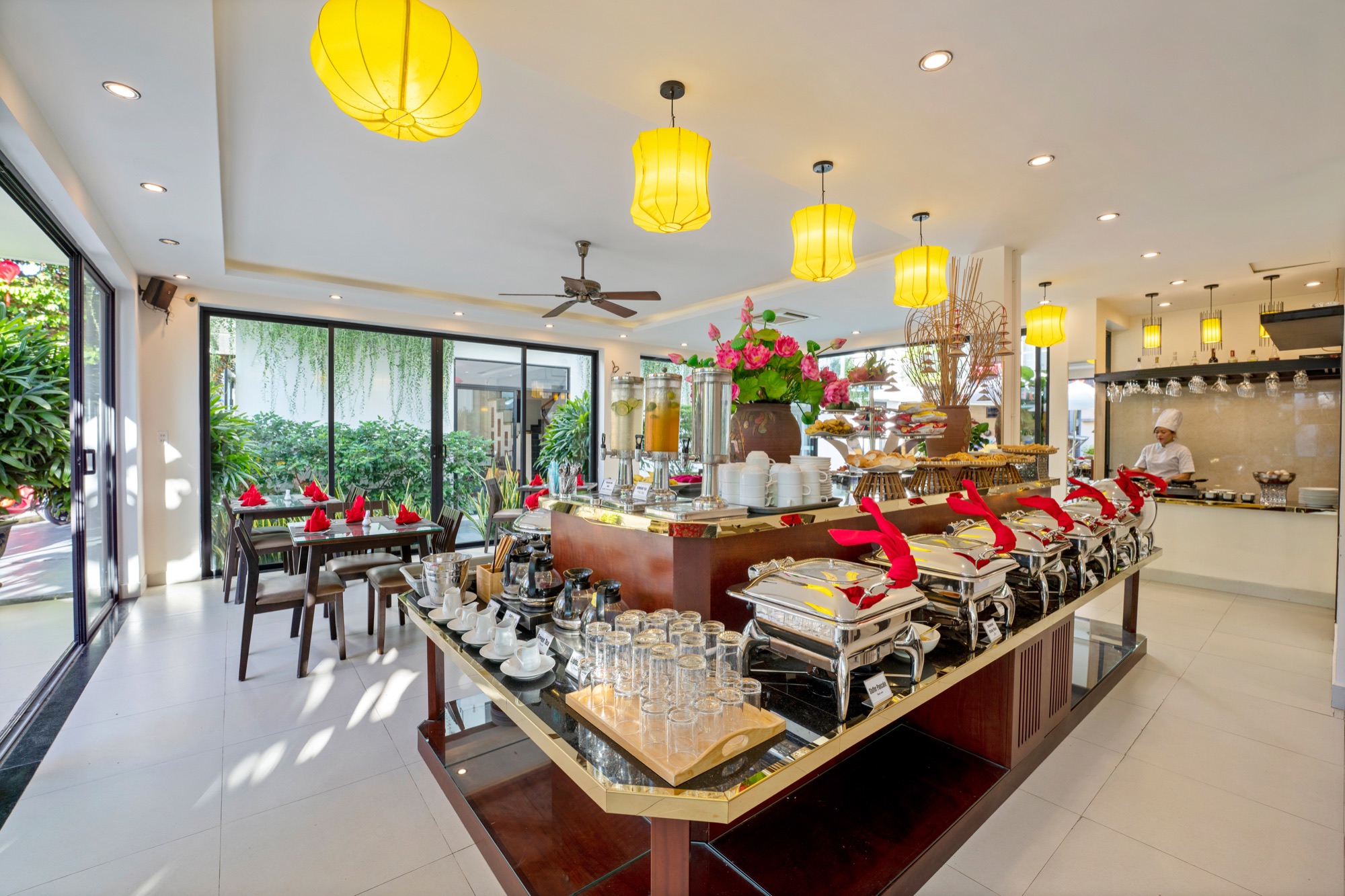 Green Restaurant's breakfast buffet laid out under red lanterns